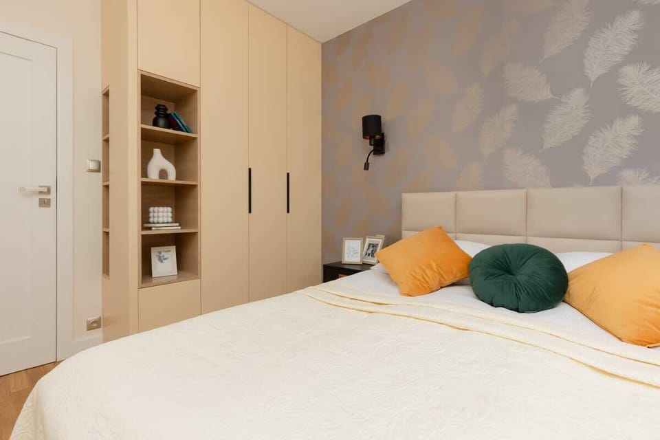 A cozy seating area in the bedroom, offering a perfect spot to relax with a book or enjoy the peaceful environment.

