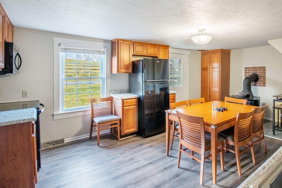 Full kitchen includes stove top, oven, microwave, refrigerator, dishwasher, and more!