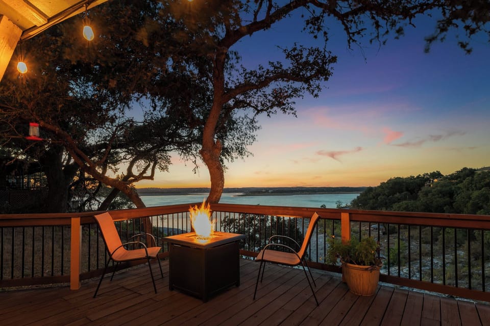 Enjoy a cozy fire with a picture perfect view of the lake