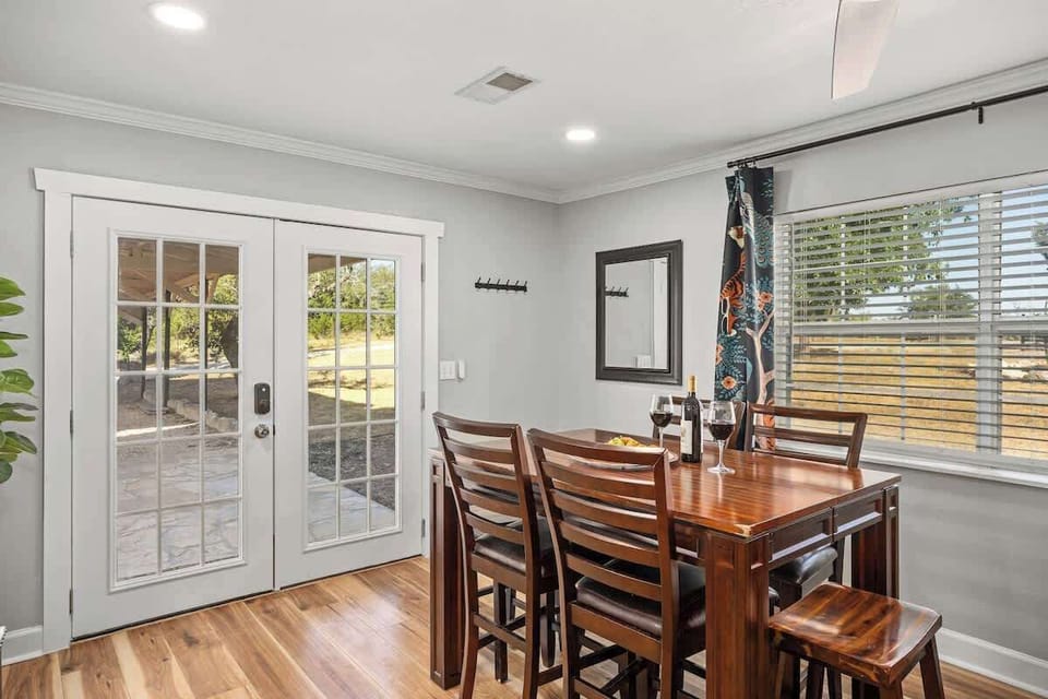 Dining area opens to back patio.