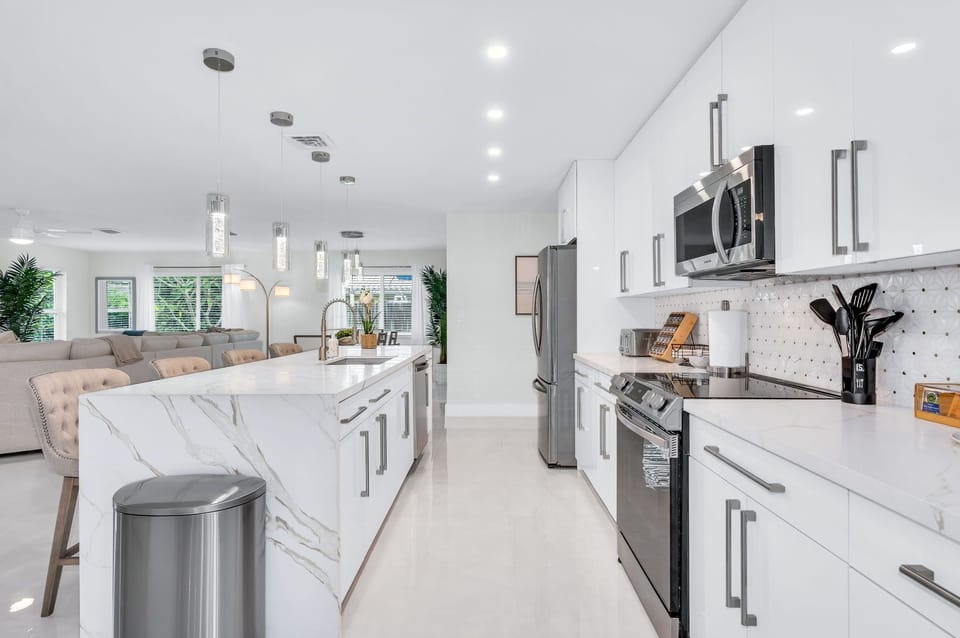 A fully stocked kitchen awaits and is equipped with all of the appliances and amenities you’d find at home, including a Dual coffee system, Airfryer and the double door fridge with plenty of room for your vacation groceries.