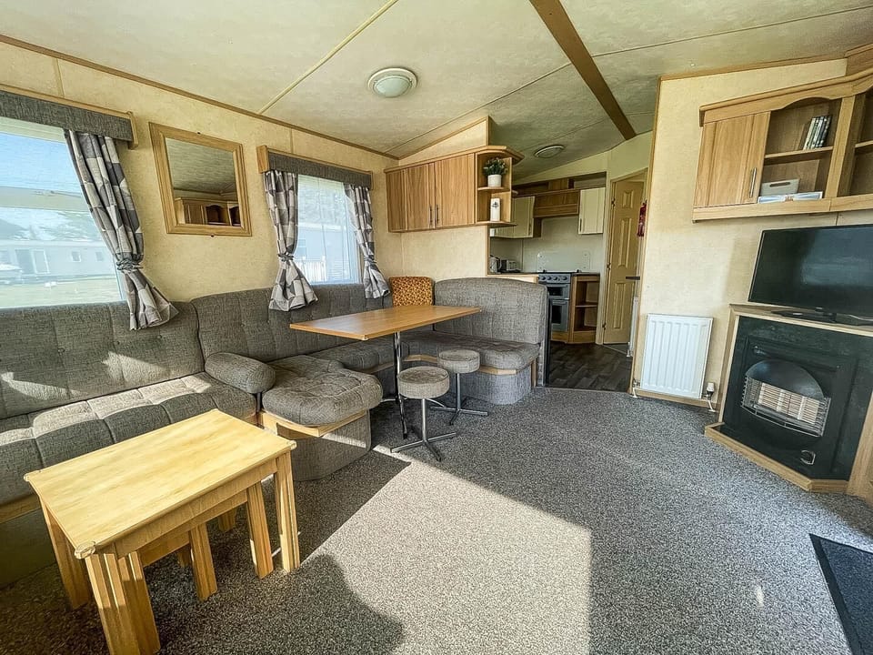 Experience the perfect family on holiday at Valley Farm Holiday Park Clacton on Sea Essex, where you can enjoy the comfort of a cosy living room in a caravan after a fun-filled day at the Clacton on Sea beach.