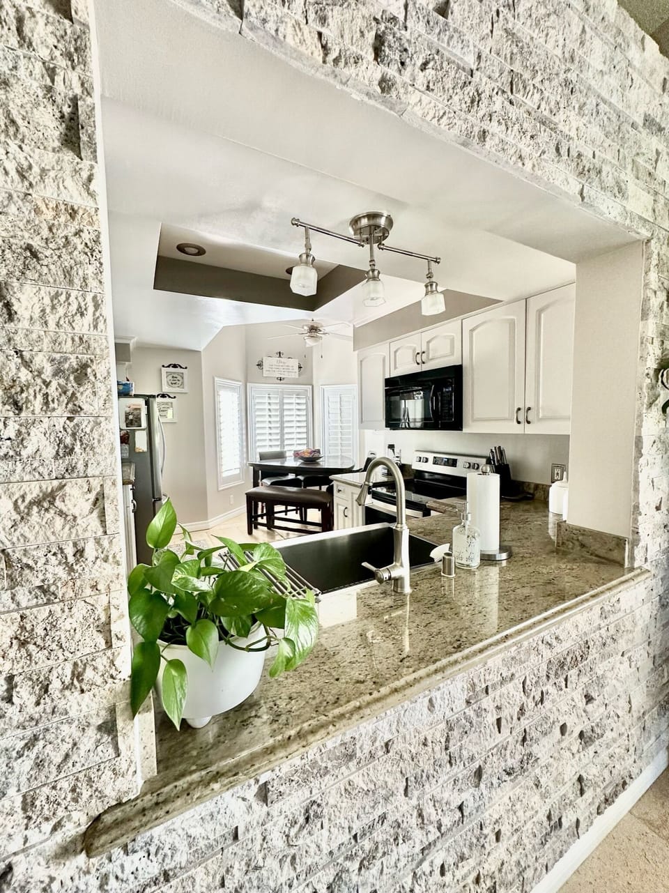 view into kitchen from dining area
