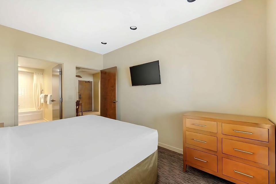 Settle in with a spacious layout and convenient dresser storage.