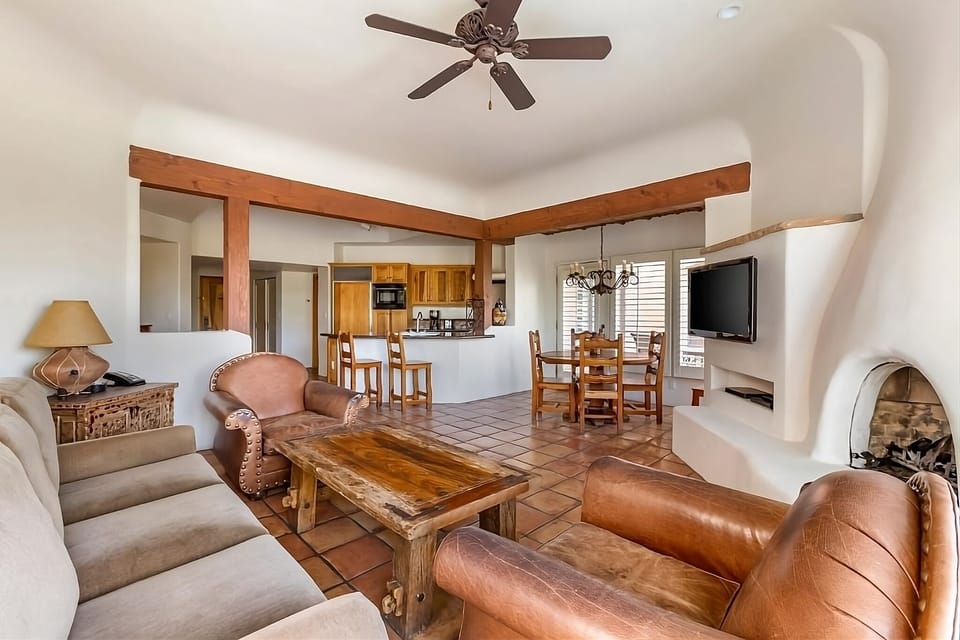 Relax in the airy great room with warm Southwestern charm.