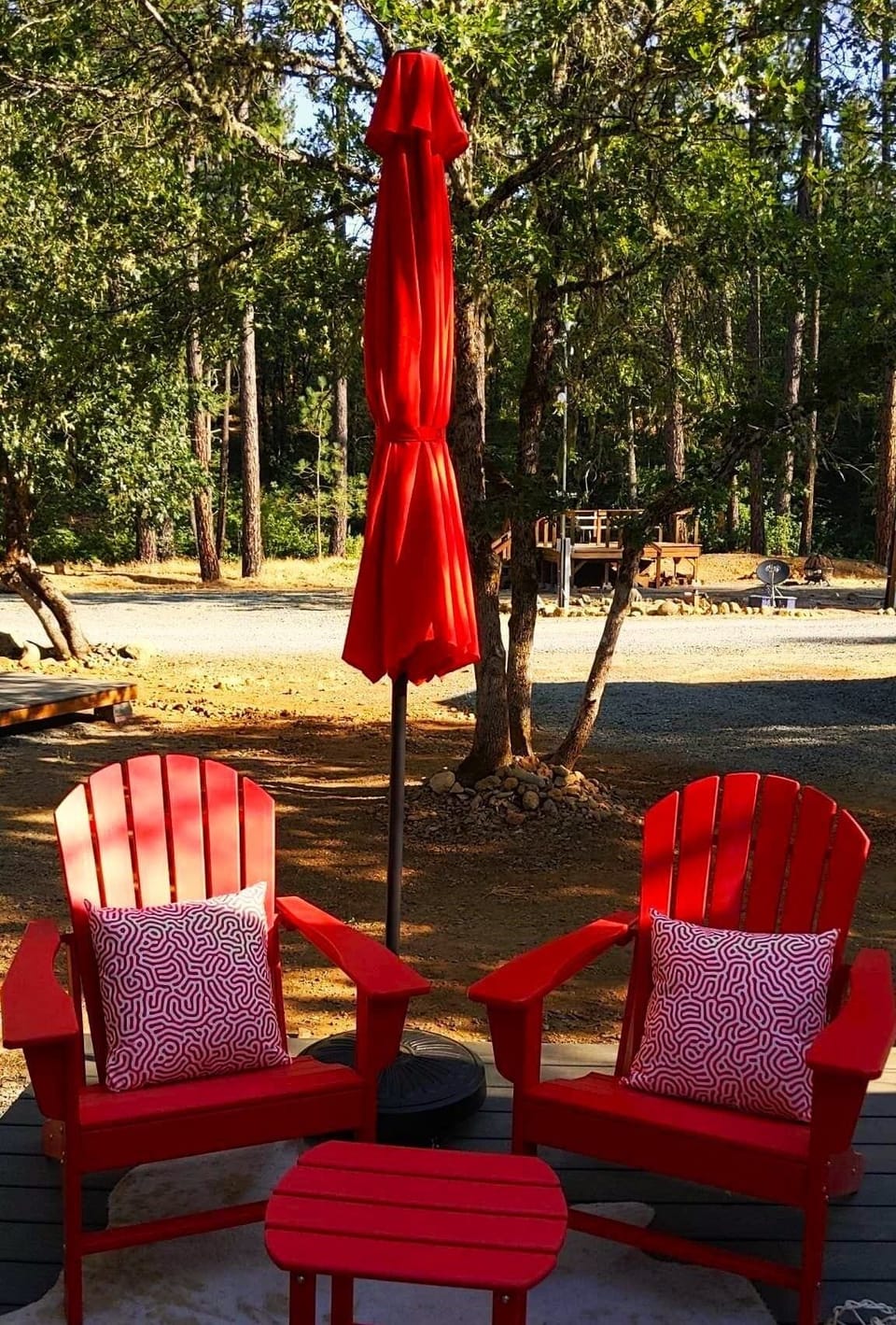 Propane firepit, outdoor chairs, and large umbrella! 