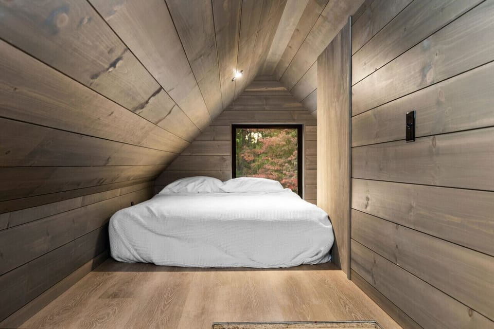 Second loft is accessed from the entry and has a queen bed.