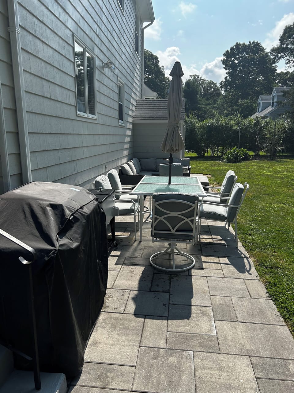 Gas grill, table  w/umbrella, sectional with table, outdoor shower, picnic table