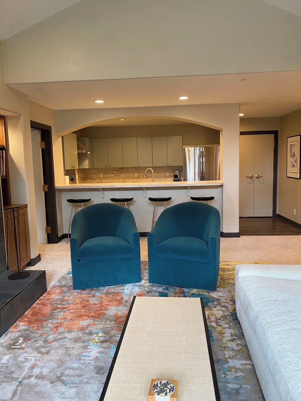 Living room looking into the breakfast bar and kitchen