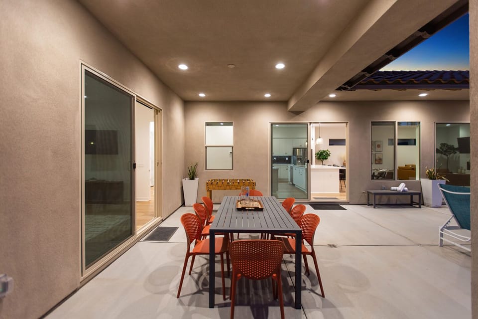 Enjoy your delicious dinner on the patio dining table with room for eight.