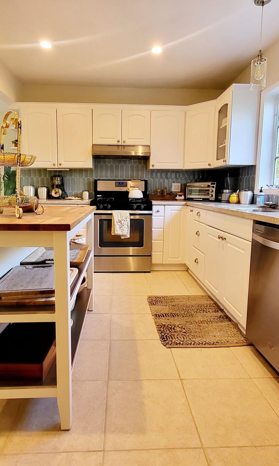 well stocked kitchen with all the gadgets and goodies a real cook wants