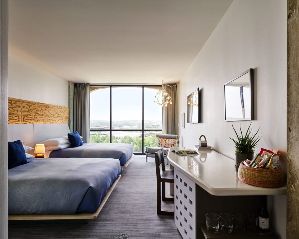 Stretch out and plan the day at your sunny in-room desk.