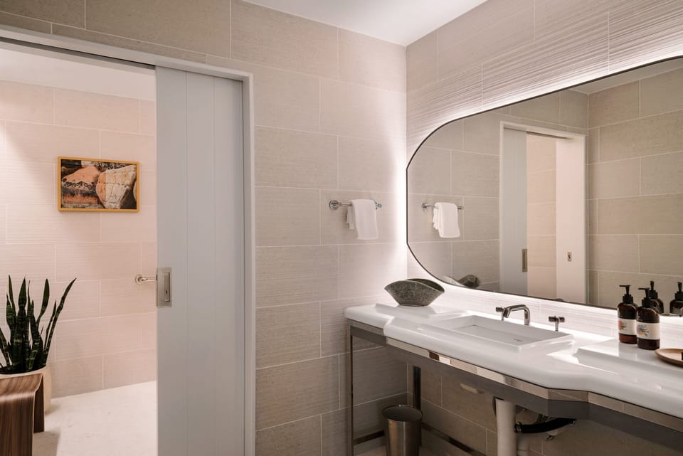 Refresh at a glowing vanity with spa-like calm.