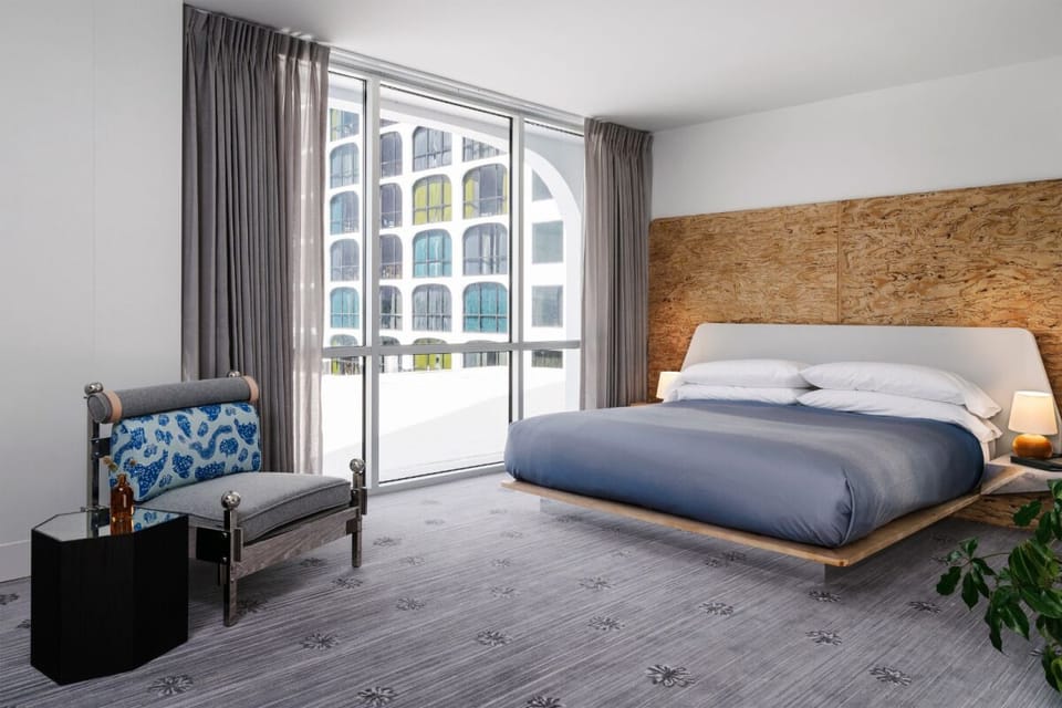 Unwind by oversized windows and drift into deep comfort.