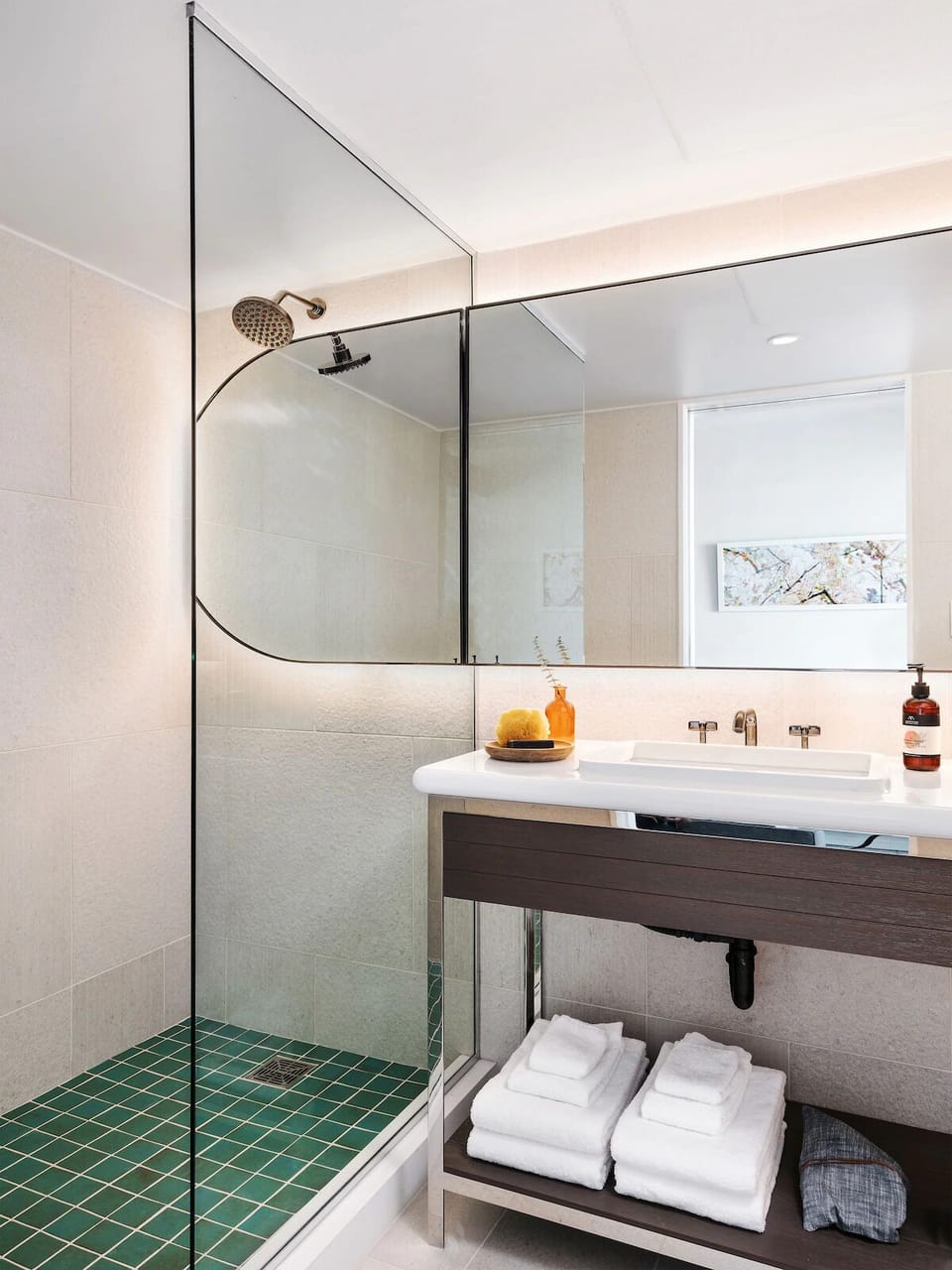 Rinse off under a rainfall shower in bright, modern style.