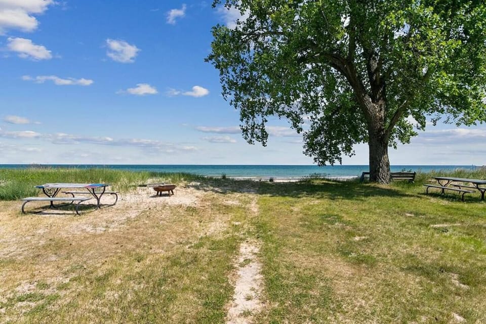 Walk out back door to beach