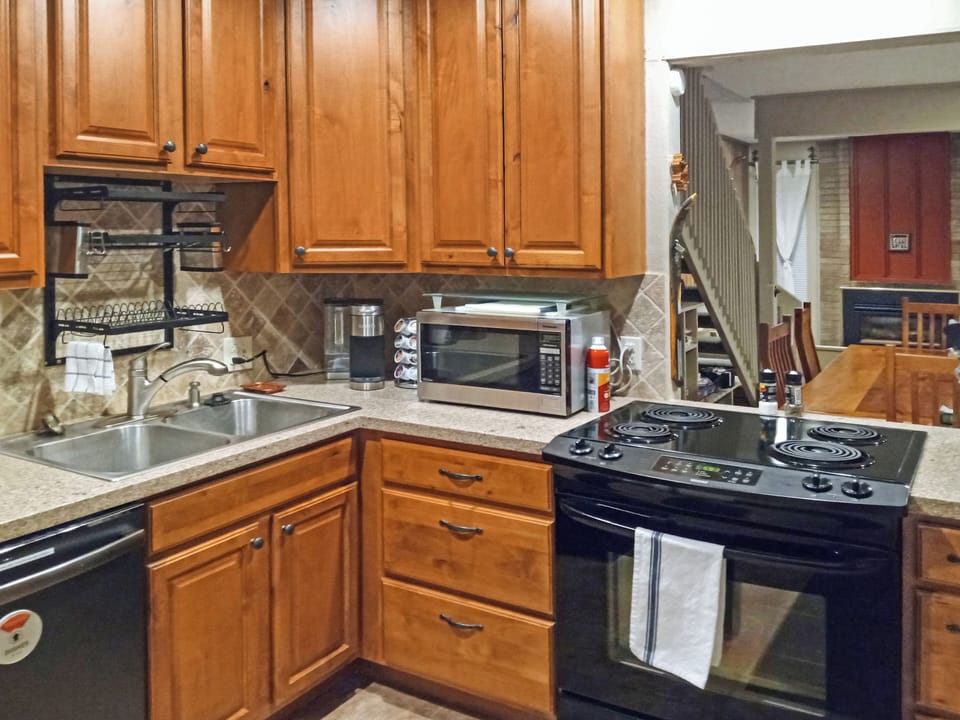 Kitchen looking to the mesquite dining table and living room beyond.