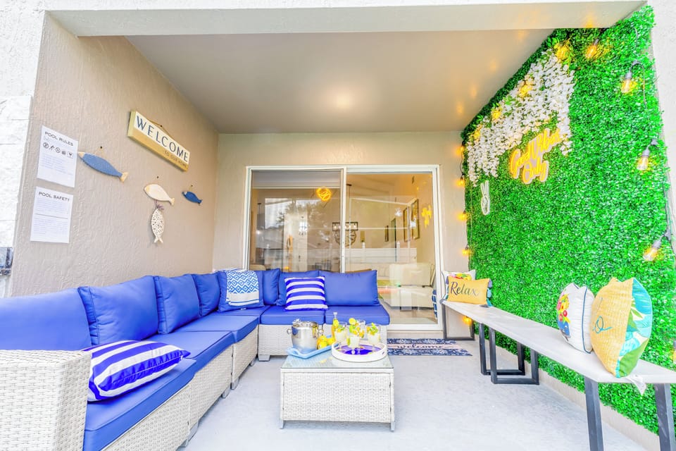 The patio offers plenty of seating for guest to gather, and Instagram-able wall.