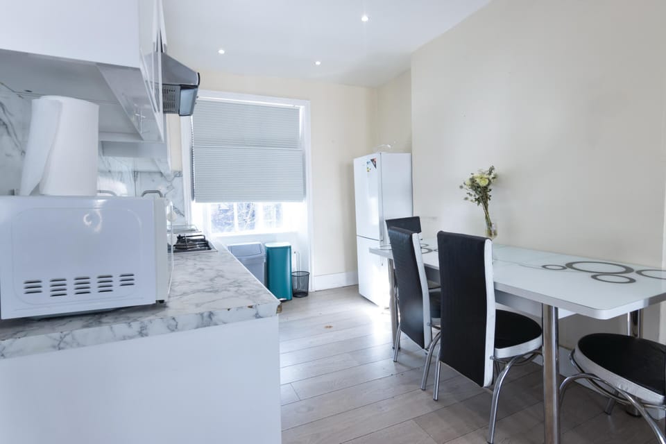 kitchen area fully equipped with dining table for 6 people