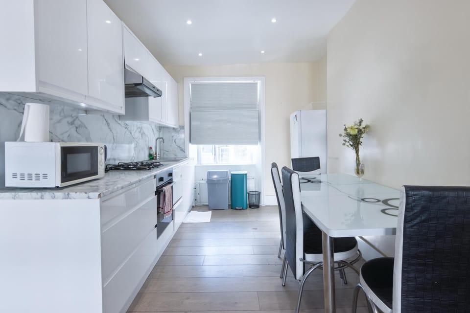 kitchen area fully equipped with dining table for 6 people