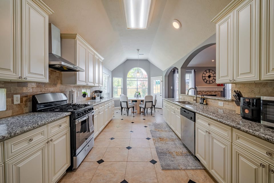 Large kitchen with kitchenware for your cooking.