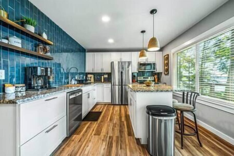 Full kitchen. Breakfast bar for additional seating for three.