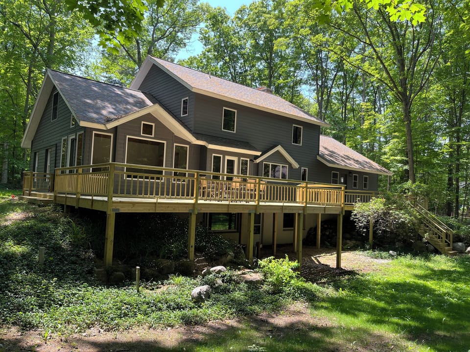 Rear view of house, back deck