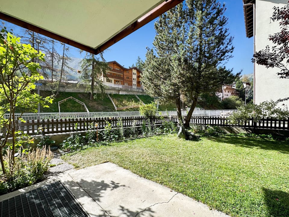 Sunny terrace with lawn and lovely views.