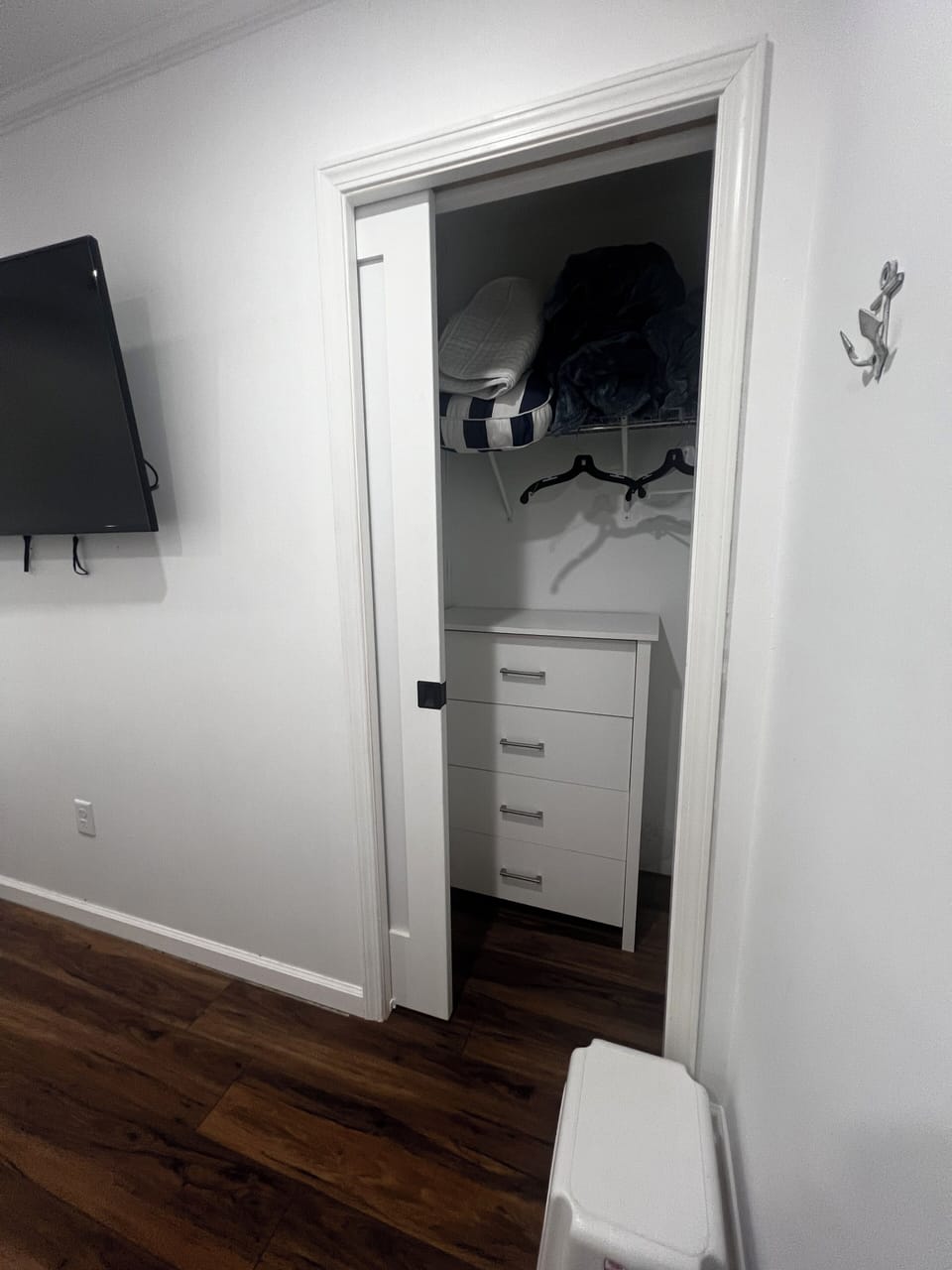New pocket doors in bedroom 3 with dresser and closet space