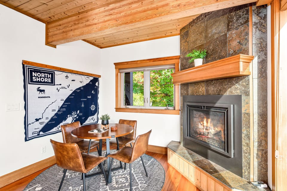 Cozy up for a card game in front of the fire on the main level. 