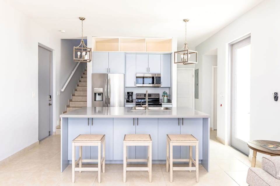 A breakfast bar to have a seat and enjoy your creations