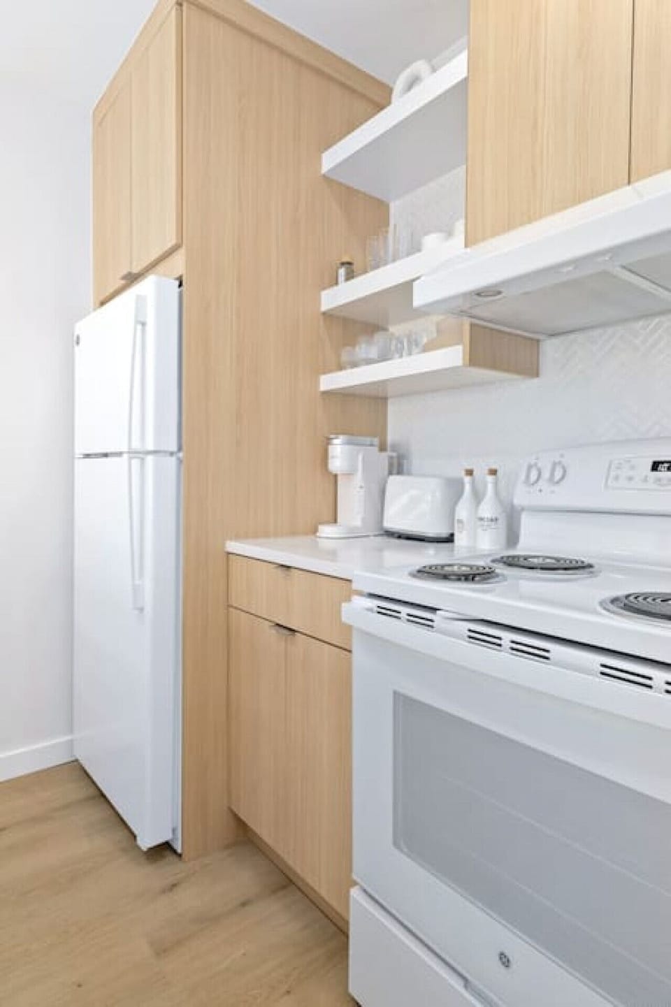 Newly upgraded kitchen with open shelf design.