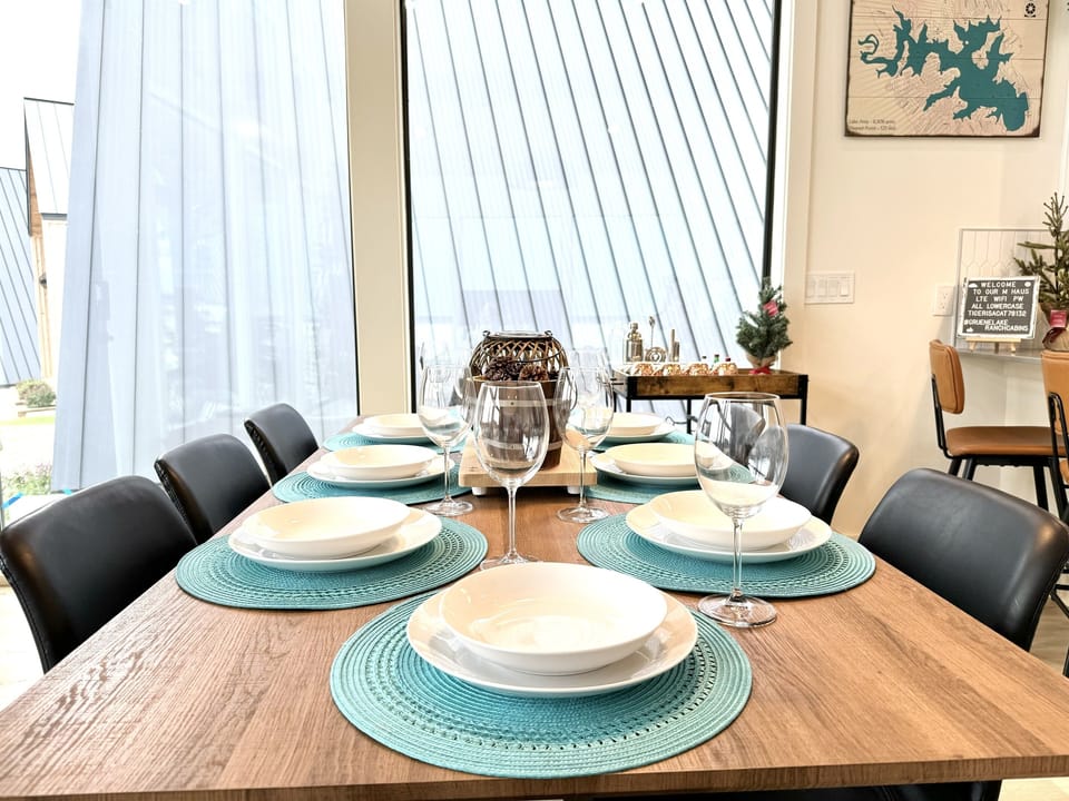 Our dining area is unique and chic, with seating for 8 and big windows to immerse with nature while enjoying your meal.