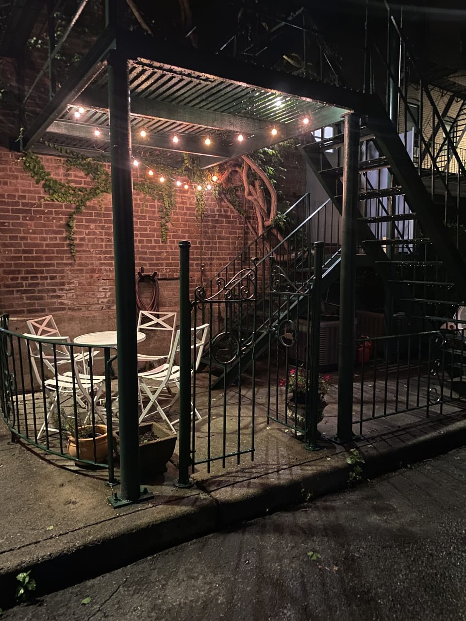 Door front patio softly lit.