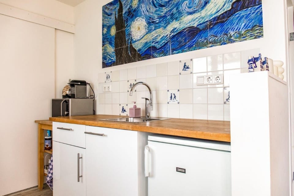 Kitchenette for preparing breakfast or coffee and tea.