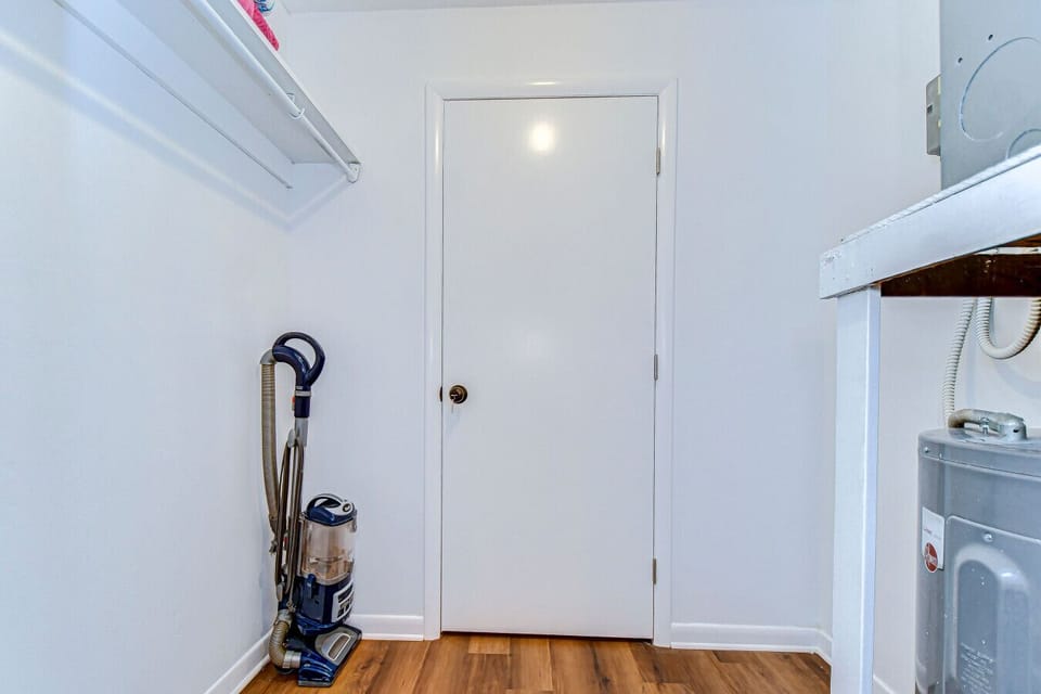 Our spacious walk in closet - we also provide plenty of pool towels and beach gear