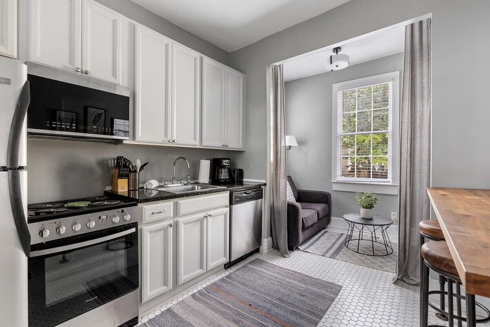 Fully stocked kitchen kitchen with seating for your group 