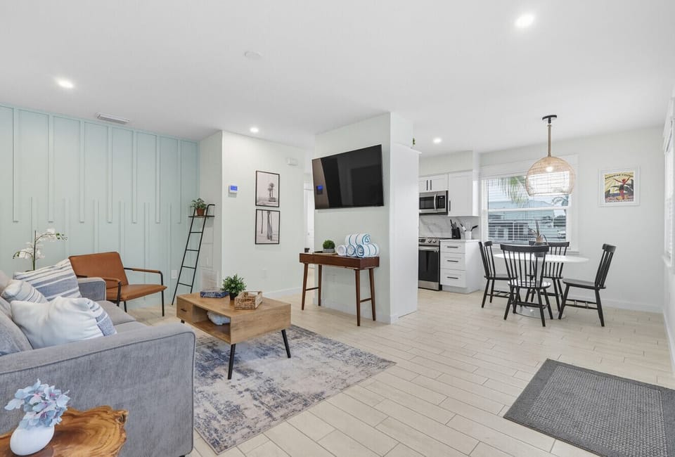 open living/dining area with natural lighting