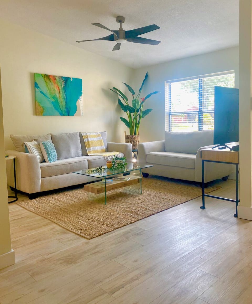 This open floor plan with vaulted ceilings make this space light and airy