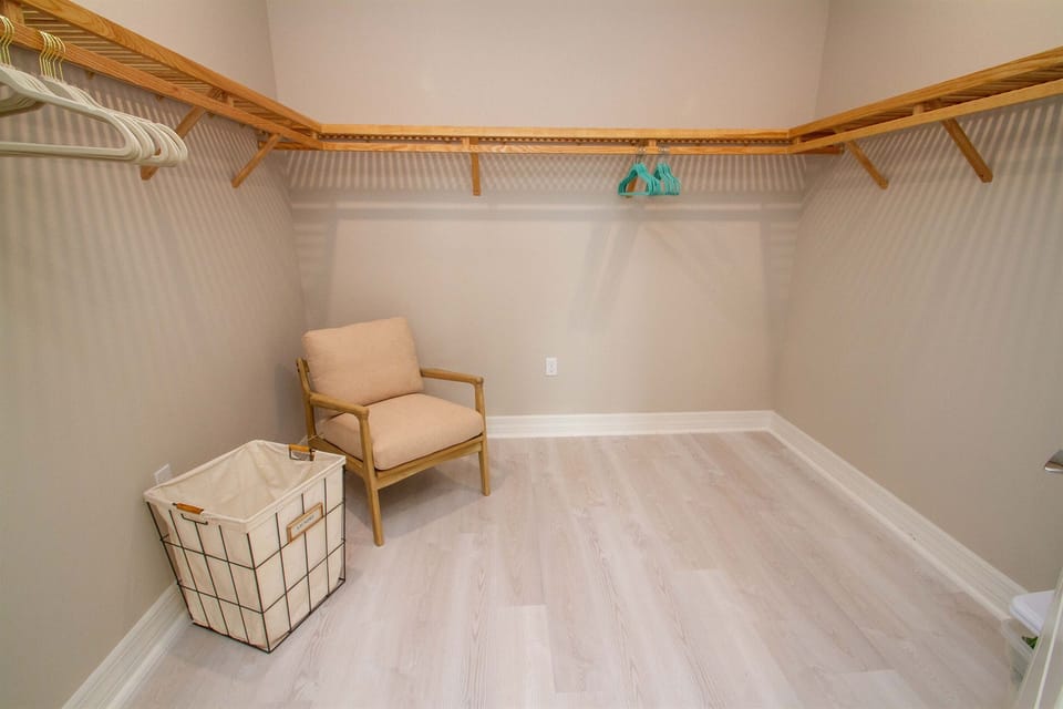 large walk-in closet off primary bedroom