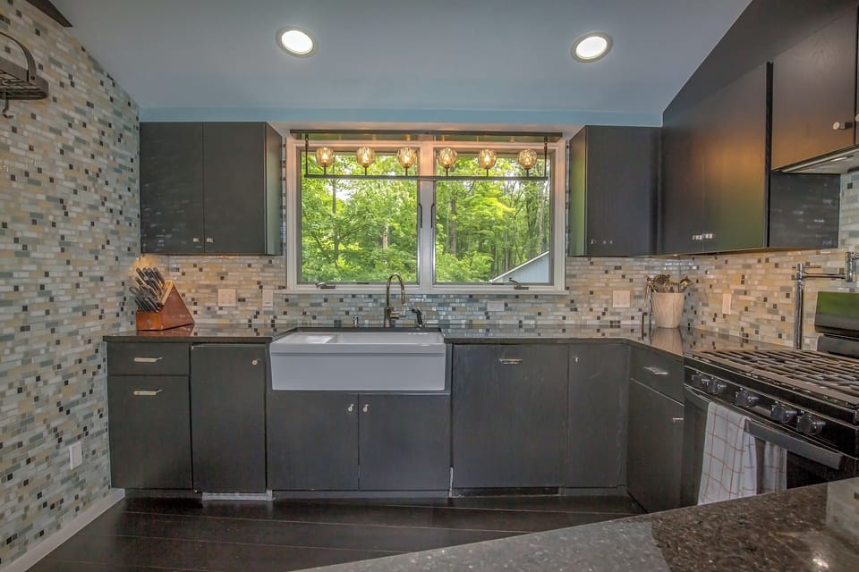 Kitchen is roomy and has wonderful view of front gardens