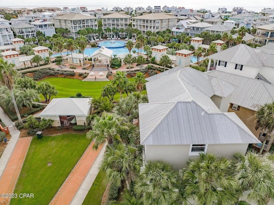One of very few homes with green space next to the home to get outside and enjoy