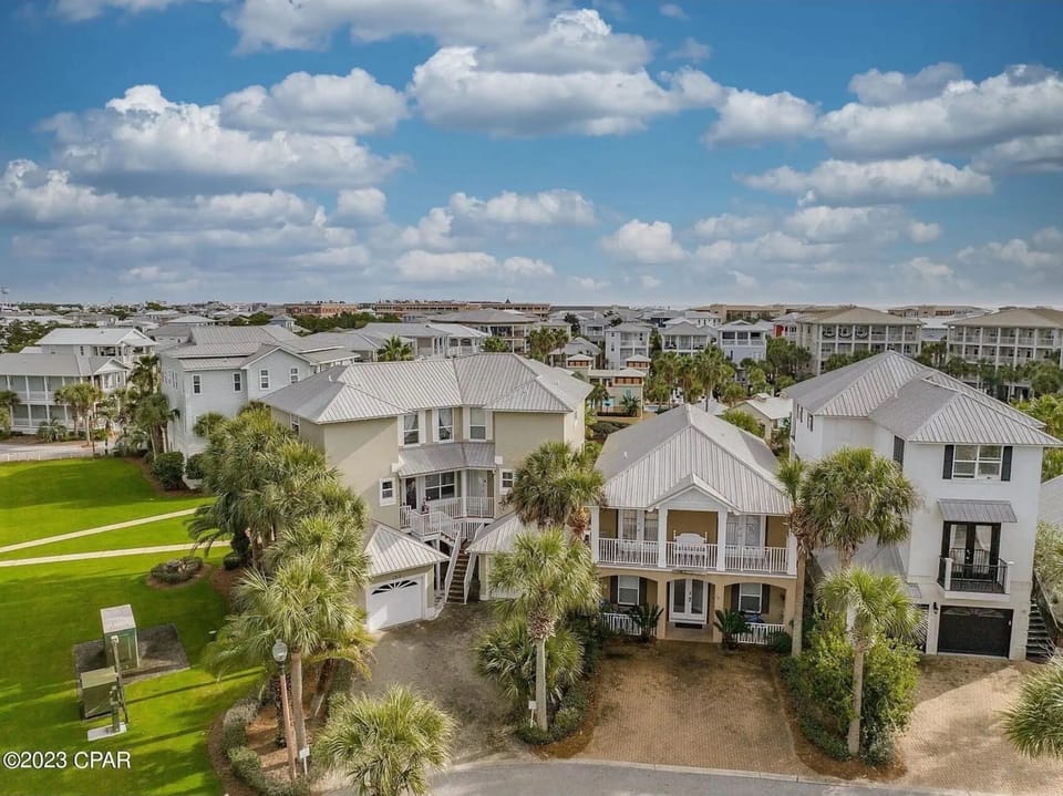 One of very few homes with green space next to the home to get outside and enjoy
