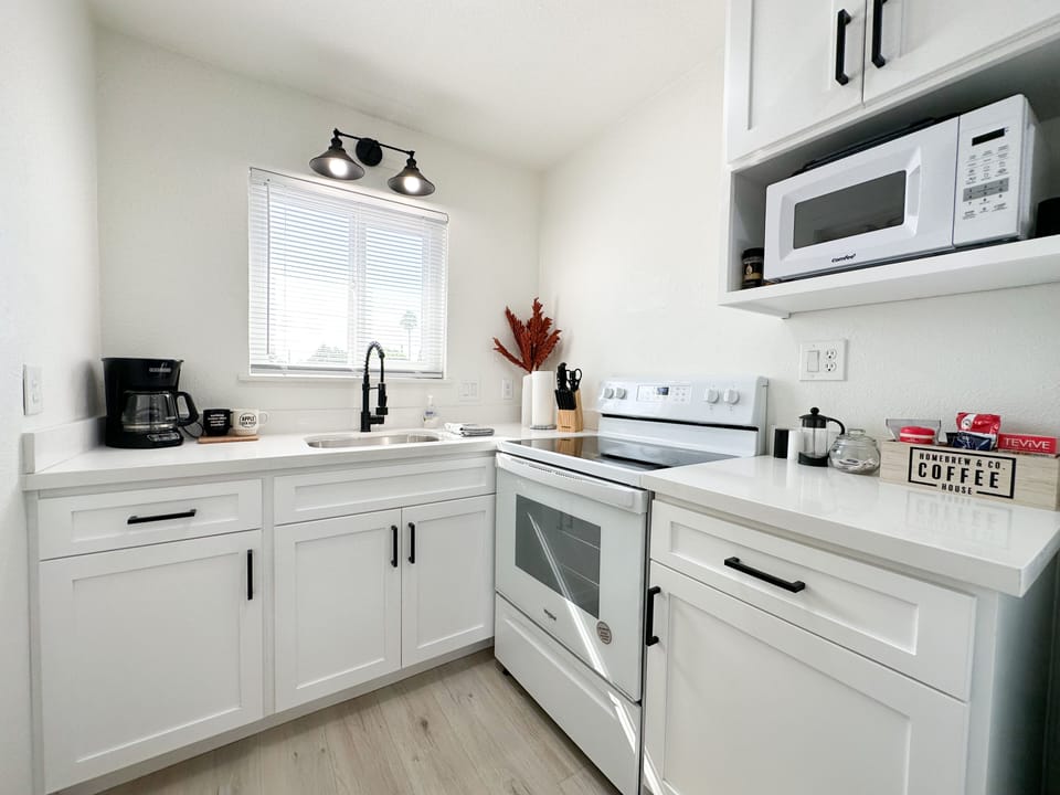 Kitchen area, standard coffee maker, microwave, electric oven/stove