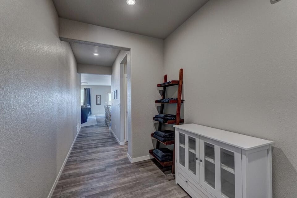Front entryway - two bedrooms and bathroom to the left, master bedroom down the hall and to the right of the kitchen.
