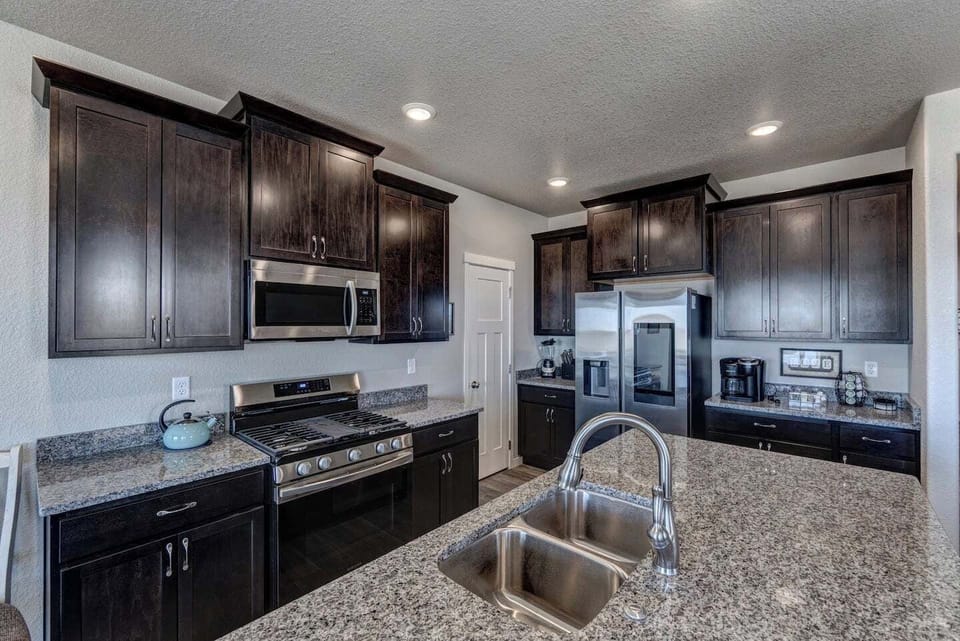 Gas stove, microwave, large fridge with lots of space to store groceries for extended stays