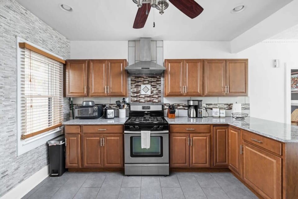 Our strikingly elegant kitchen, fully equipped with all the essential tools and appliances