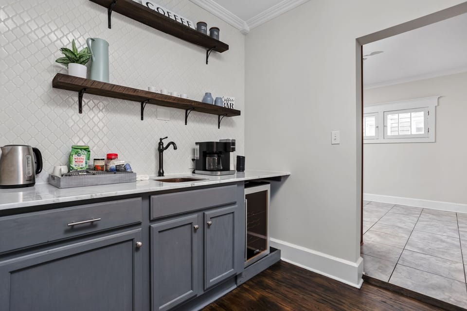 Coffee Bar: Brew your favorites in a stylish kitchen nook with chic shelving and modern flair!