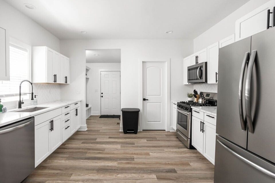 Fall in love with our clean, luxurious kitchen – a haven equipped with essential utensils and appliances designed for your convenience. This space is meticulously crafted to ensure your kitchen experience is both delightful and effortless.