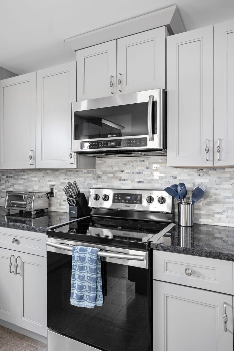 Kitchen: Whip up culinary delights in this stylish, fully equipped kitchen with sleek appliances!